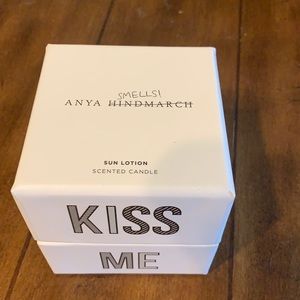 New in box Anya Hindmarch candle. Sun lotion scent